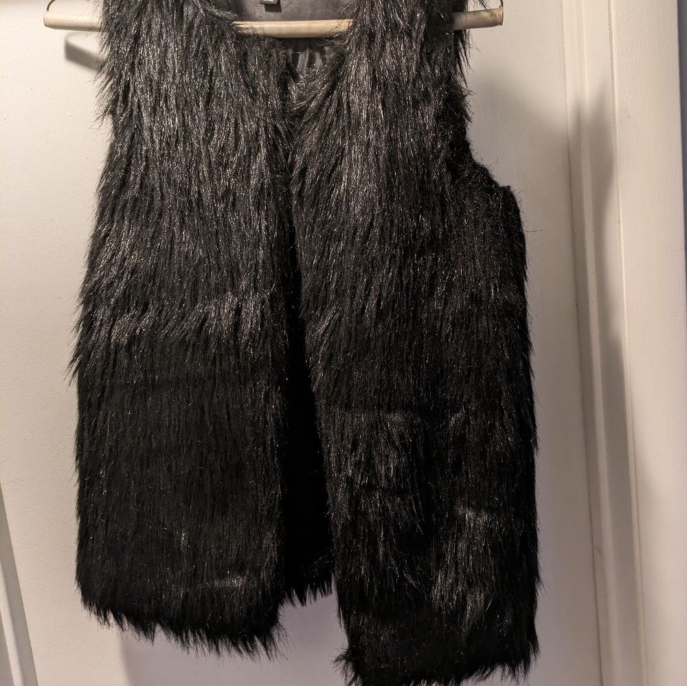 Black faux fur vest